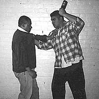 Todd Group instructor demonstrating a close-range self-defence response